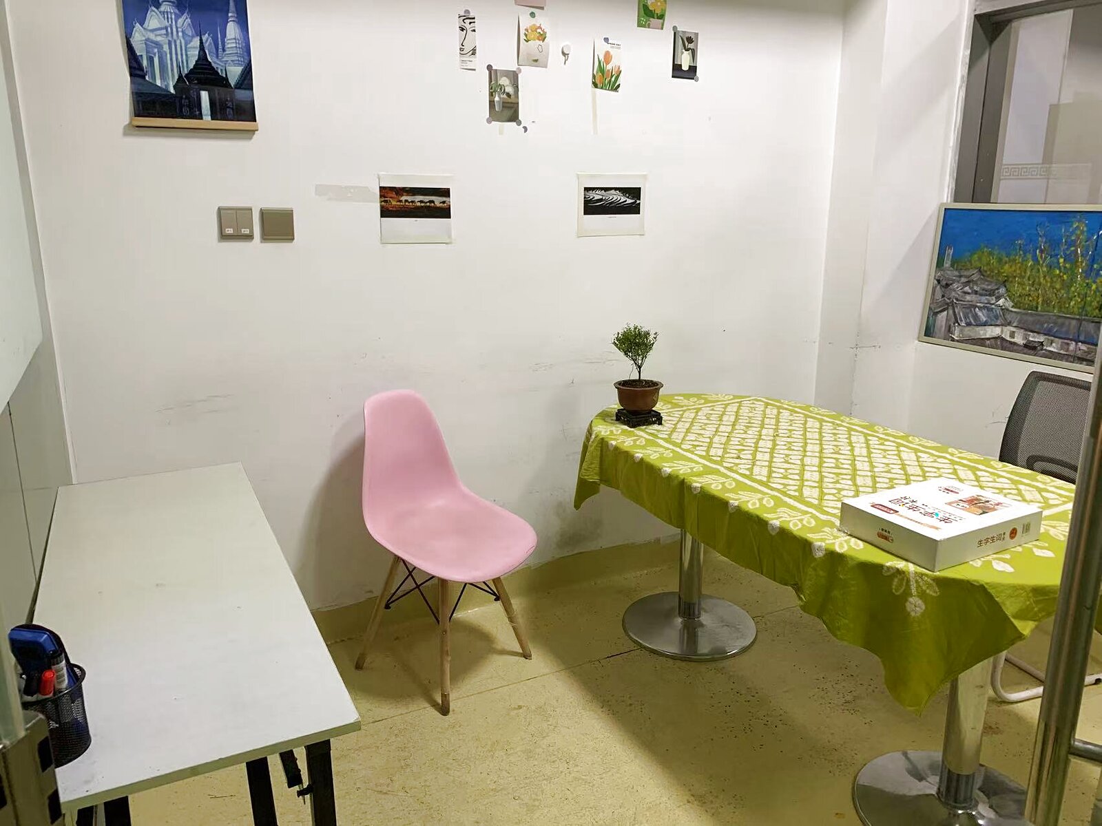 KCEL one-on-one tutoring space with study desks and student artwork
