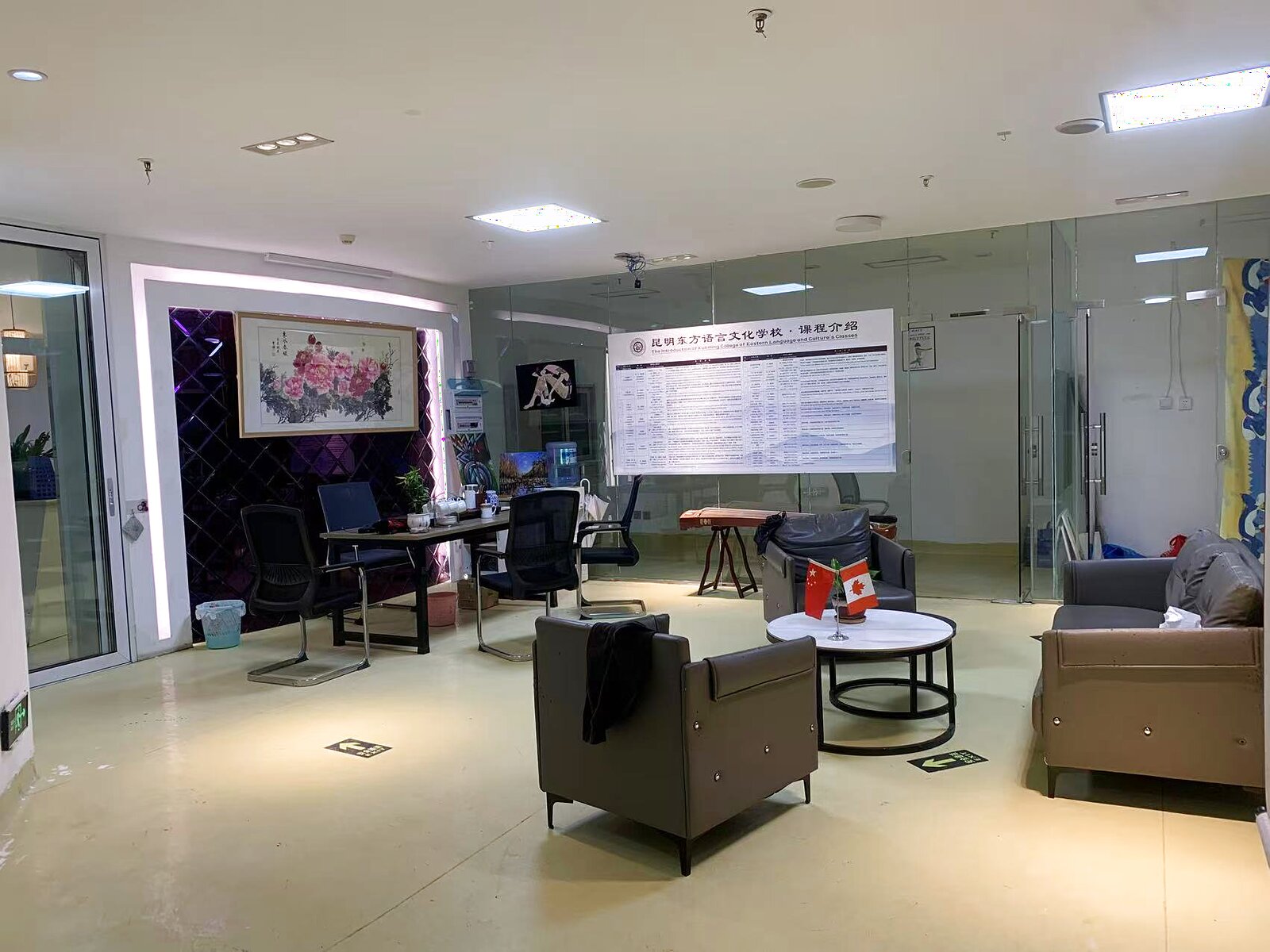 KCEL renovated common area with comfortable sofas and meeting tables