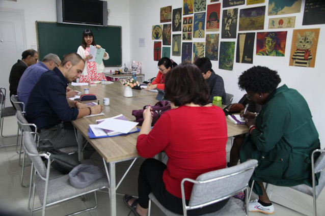 International students in KCEL Mandarin class — group of learners from multiple countries studying Chinese at Kunming's first dedicated Chinese language school